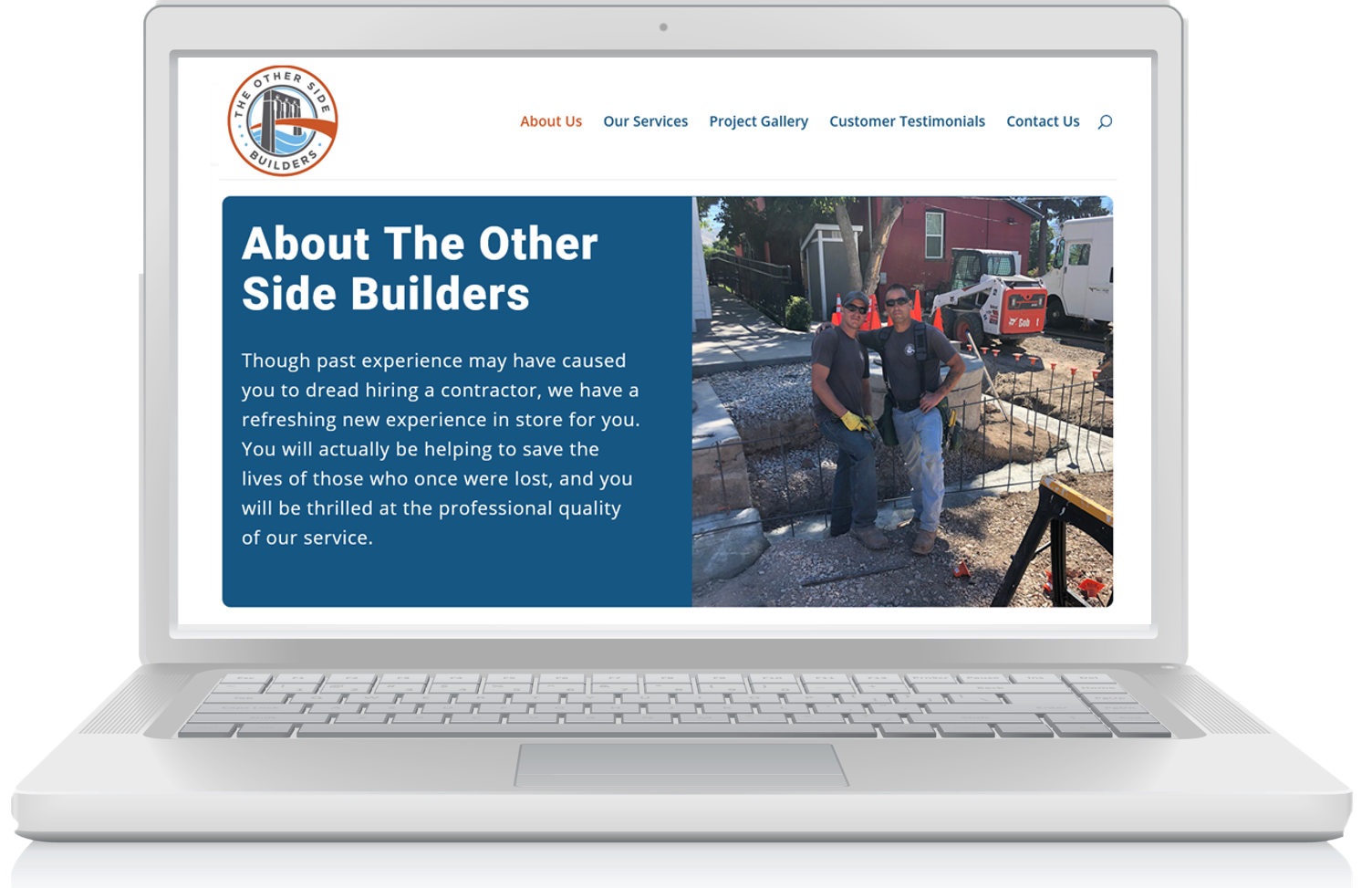 Image of laptop computer with The Other Side Builders homepage displayed on the screen.